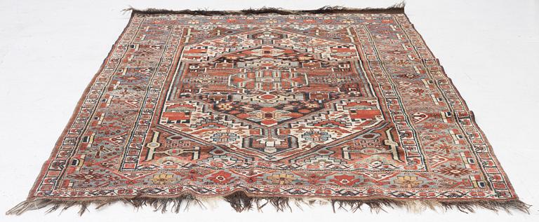 An antique Qashqai rug, southeastern Iran, c. 242 x 170 cm.