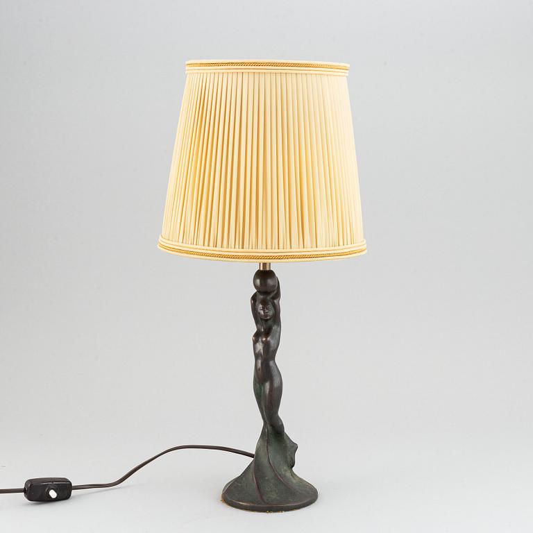 Halvar Frisendahl, a patinated bronze table lamp, signed and dated 1919.