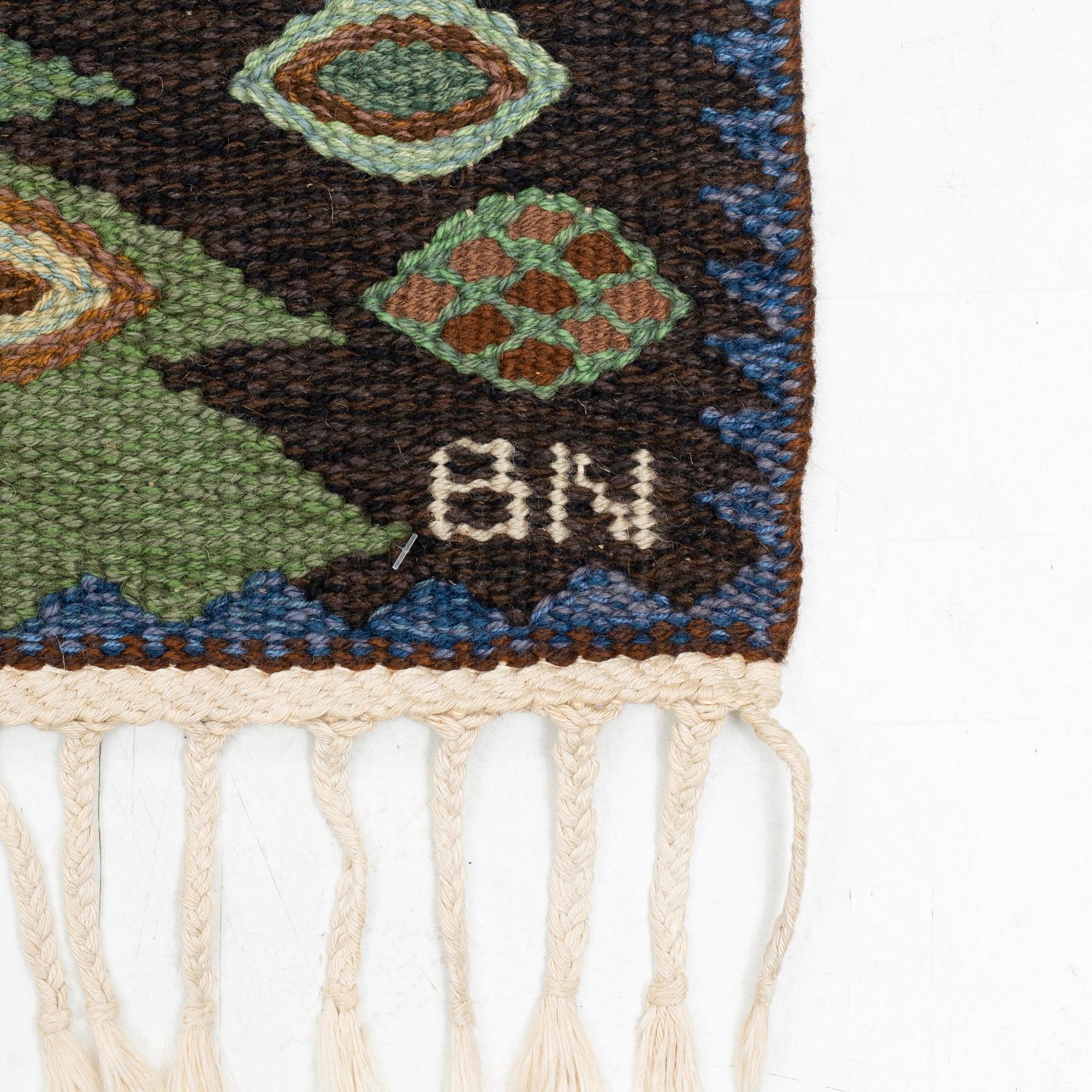 Barbro Nilsson, a carpet, flat weave, "Tånga brun och grön", ca 273 x 211 cm, signed AB MMF BN.