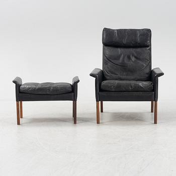 Hans Olsen,  a black leather easy chair with a stool, CS Möbler, Denmark, 1950's-60's.