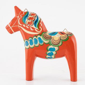 Dala horses, 4 pcs, and one wall-mounted, second half of the 20th century.