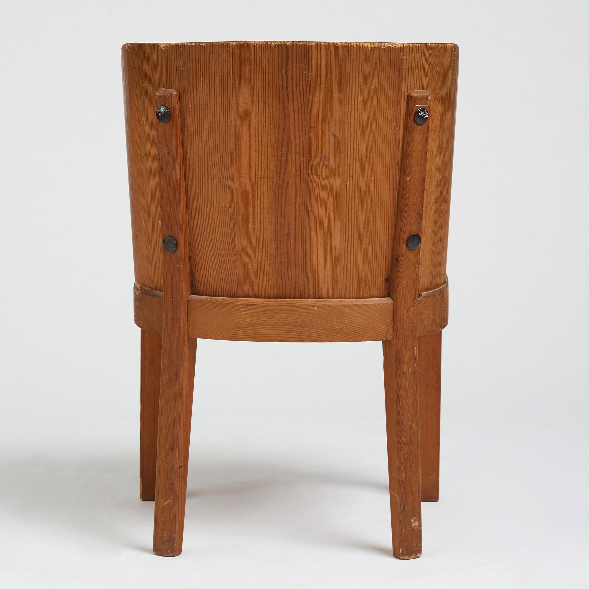 Axel Einar Hjorth, a stained pine low back "Lovö" chair, Nordiska Kompaniet, Sweden 1930's.