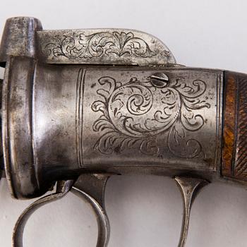 A mid-19th century British percussion pepperbox.