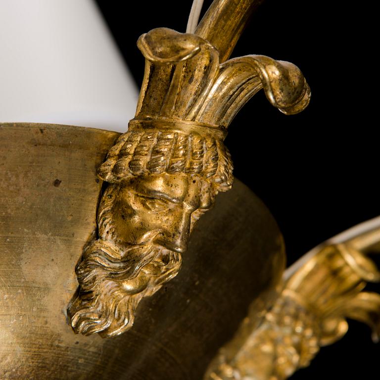 An Empire early 19th century gilt bronze six-light hanging lamp.
