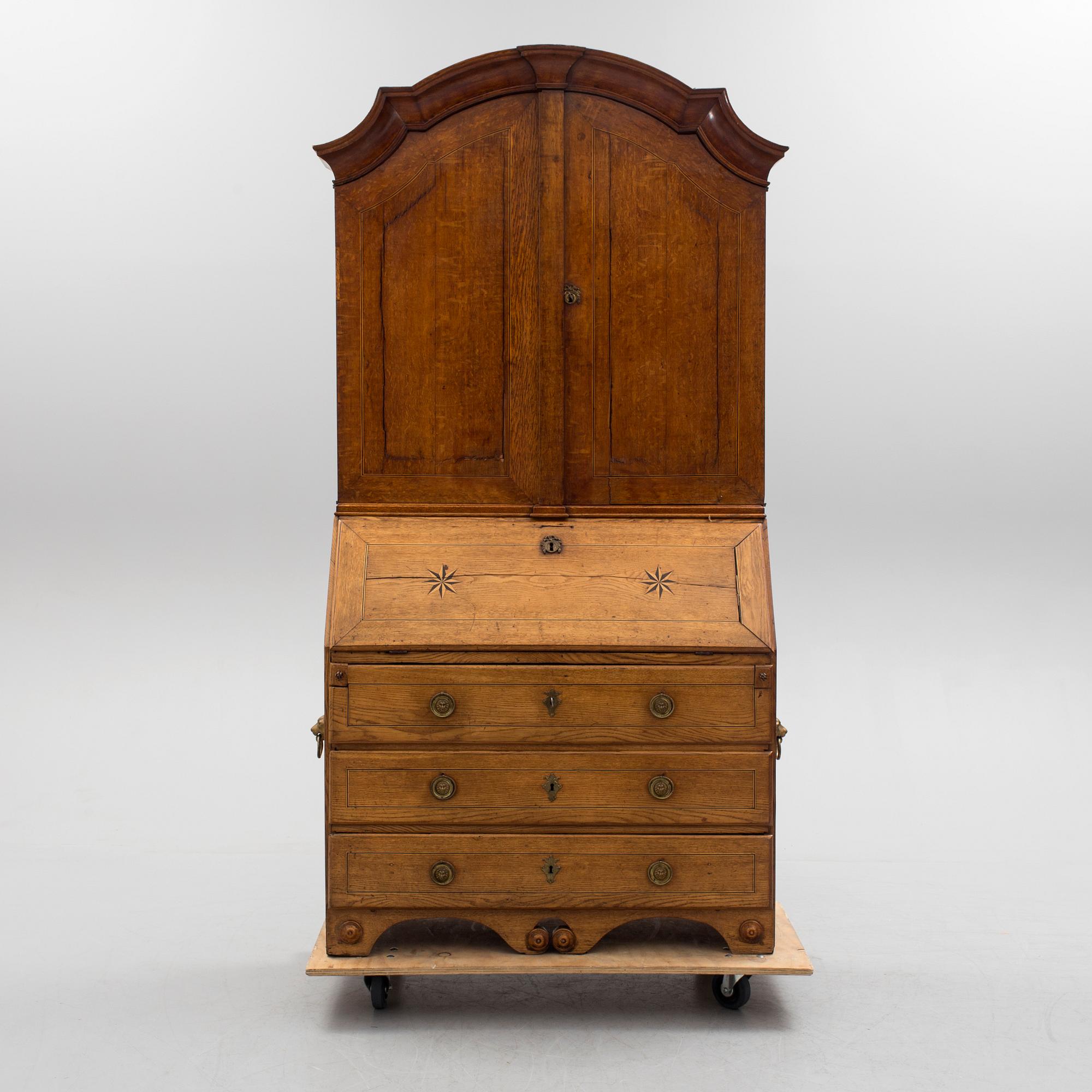 A first half of the 18th century oak writing cabinet.