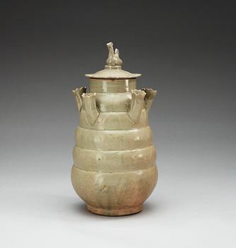 A pale celadon glazed jar with cover, Yuan dynasty.