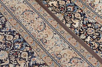 A Nain carpet, part silk, so-called 6 LAA, approx. 324 x 210 cm.