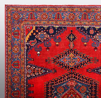 A CARPET, Wiss Signed Sharbani.  327 x 227 cm.