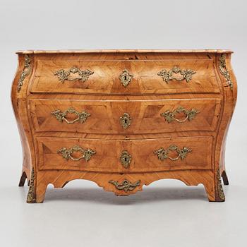 A brass-mounted and marquetry rococo commode, later part of the 18th century.