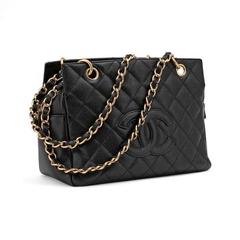 CHANEL, a black leather "Medium Shopping" handbag.