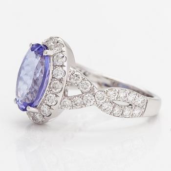 An 18K white gold ring with a ca. 3.45 ct tanzanite and diamonds ca 1.53 ct in total. IGI certificate.