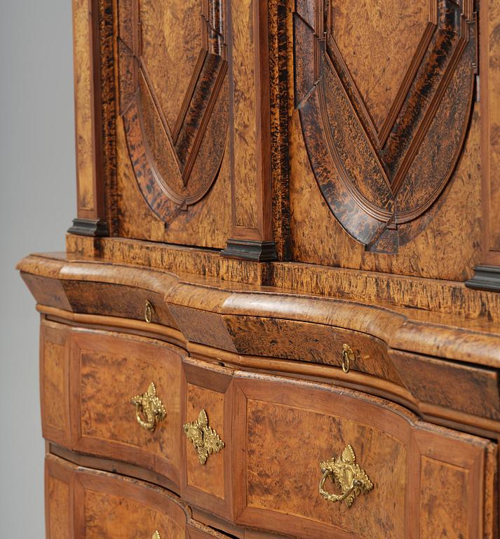 A Swedish late baroque burr-alder cabinet, first part 18th century.