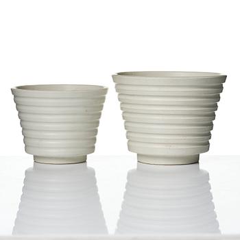 Wilhelm Kåge, A set of three ceramic flower pots, a vase and jar with lid,  Gustavsberg 1930s.