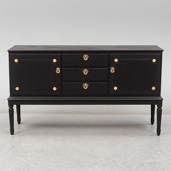 A mid 20th century painted sideboard.