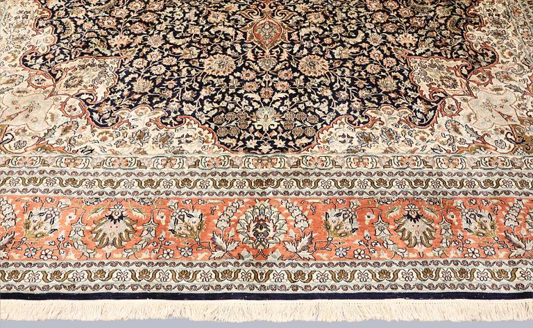 A silk carpet, Kashmir, c. 357 x 274 cm.