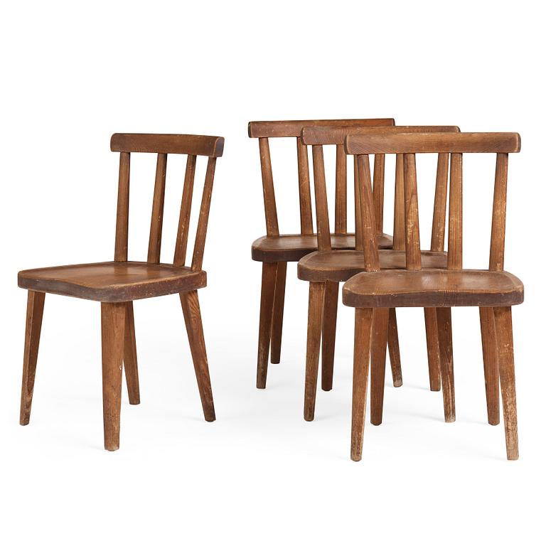 Axel Einar Hjorth, a set of four stained pine "Utö" chairs, Nordiska Kompaniet, Sweden 1930s.