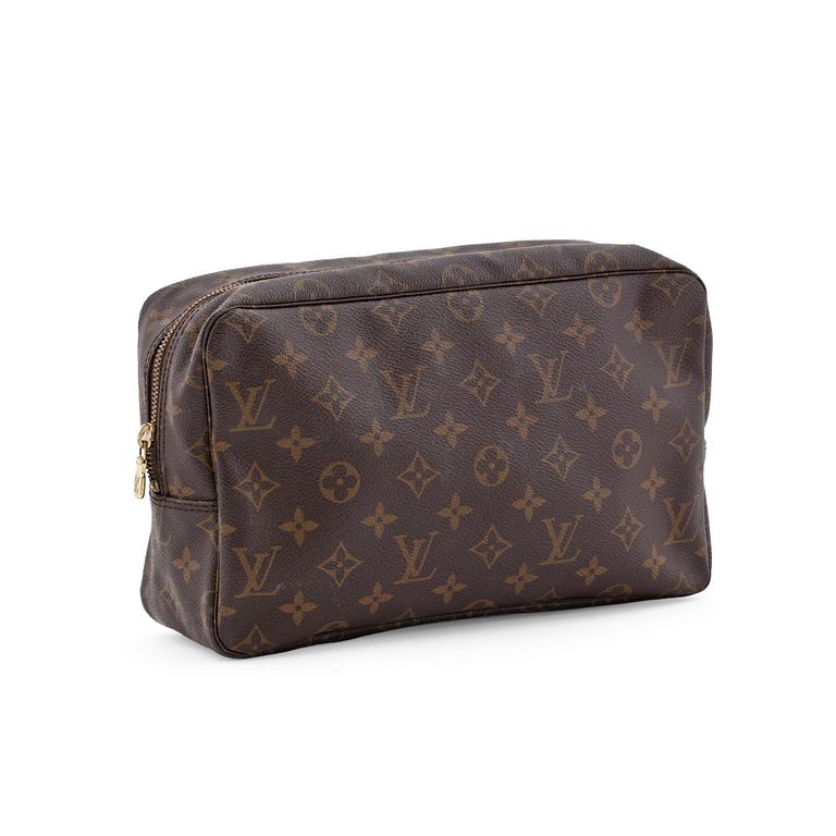 LOUIS VUITTON, a monogram canvas toiletry case.