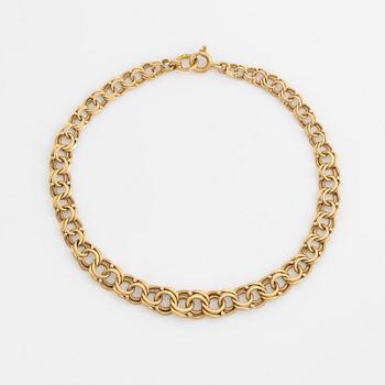 18K gold bracelet.