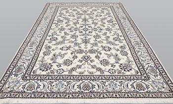 A part silk Nain carpet, ca 305 x 198 cm.