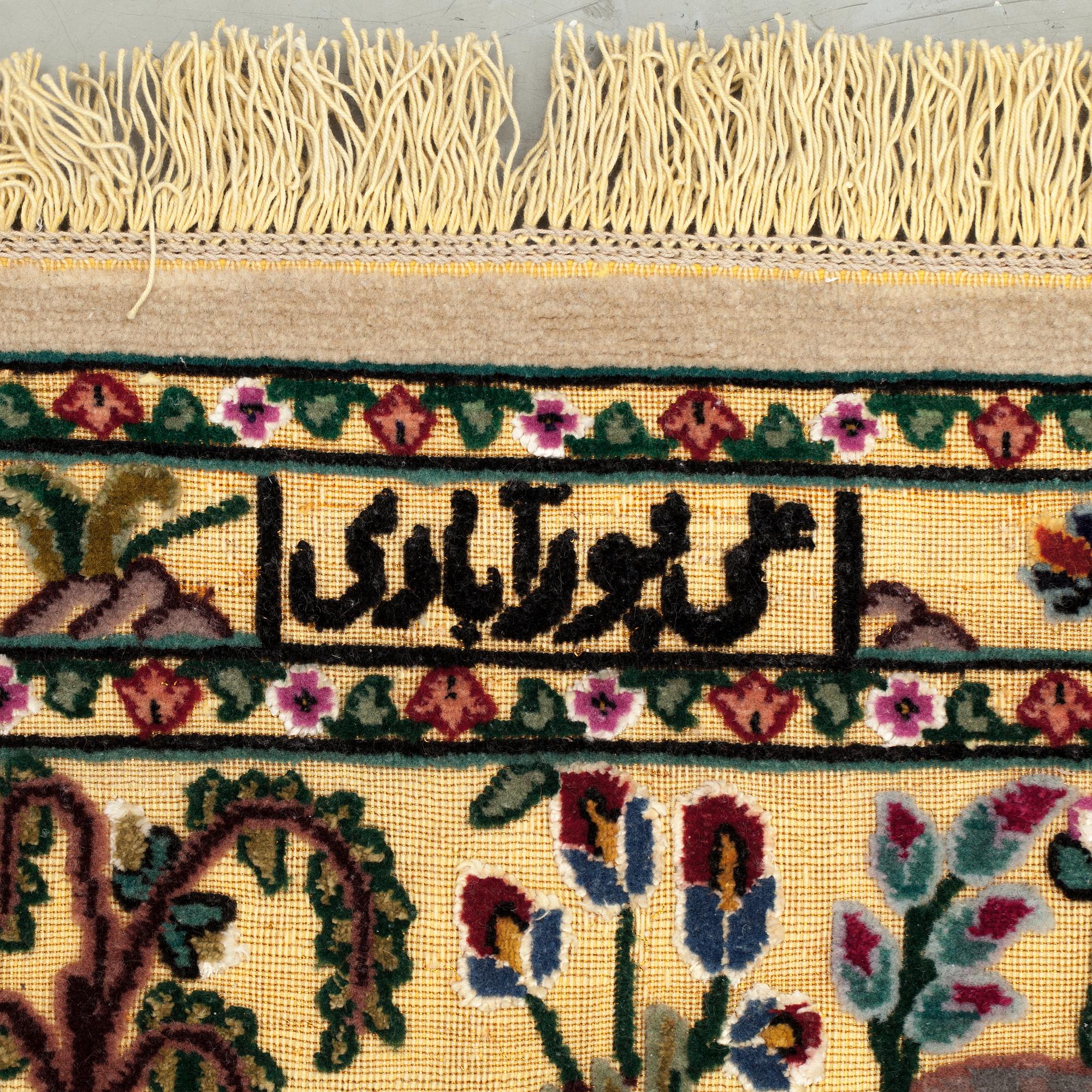 An oriental souf carpet, signed Ali pourabadi, around 295 x 195 cm.