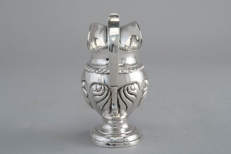 A CREAMER, silver. Roland Mellin Helsinki 1838. Height 12 cm, weight 132 g.