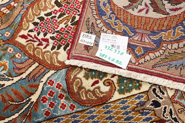 A Kazak carpet, c. 383 x 292 cm.