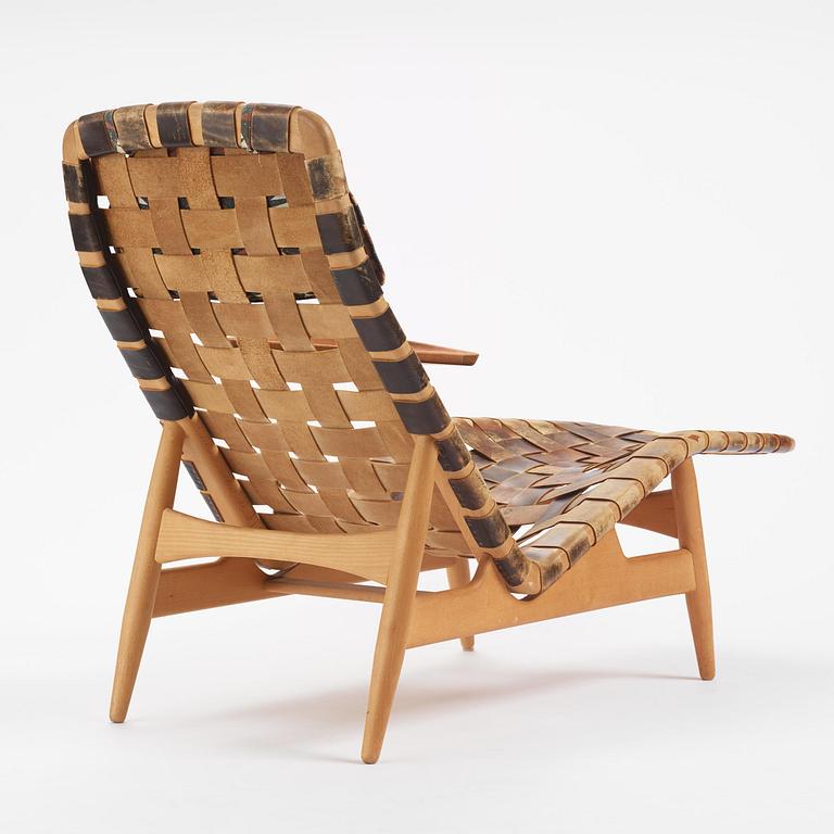 Arne Vodder, a woven leather lounge chair with attached side table, Bovirke, Denmark, 1950s.