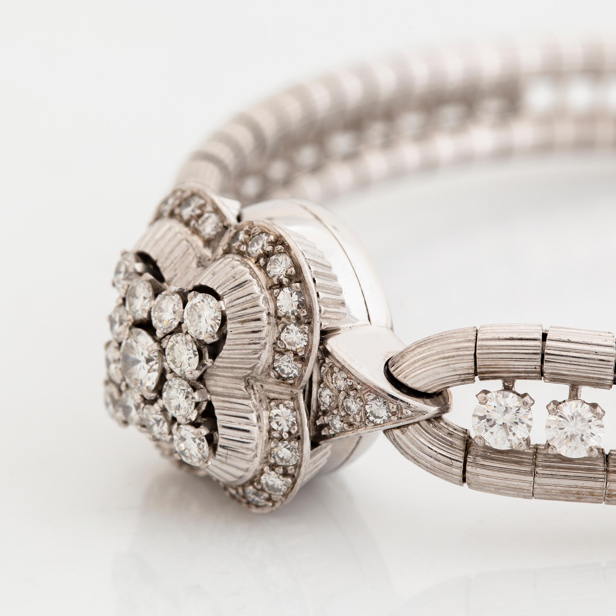 Omega brilliant cut diamond watch.