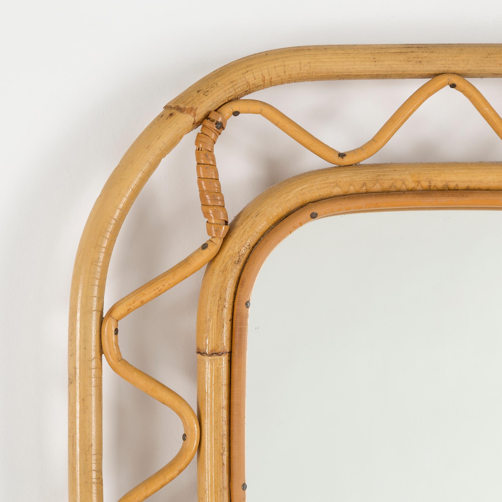 A bamboo and rattan mirror, mid 20th Century.