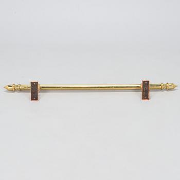 A late 20th century curtain rail / rod.