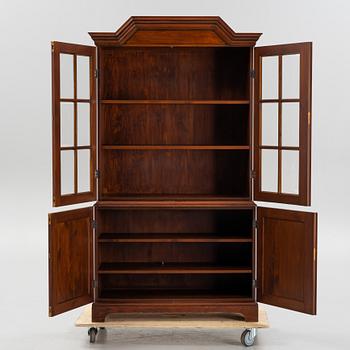 A vitrine cabinet from Åmells, dated 1975.