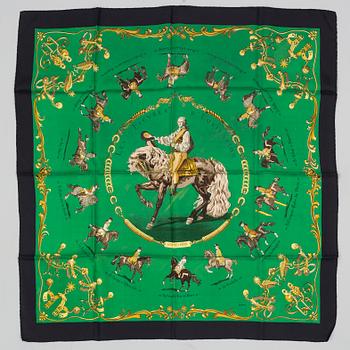 A silk scarf "les Figures d'Equitation" by Hermès.