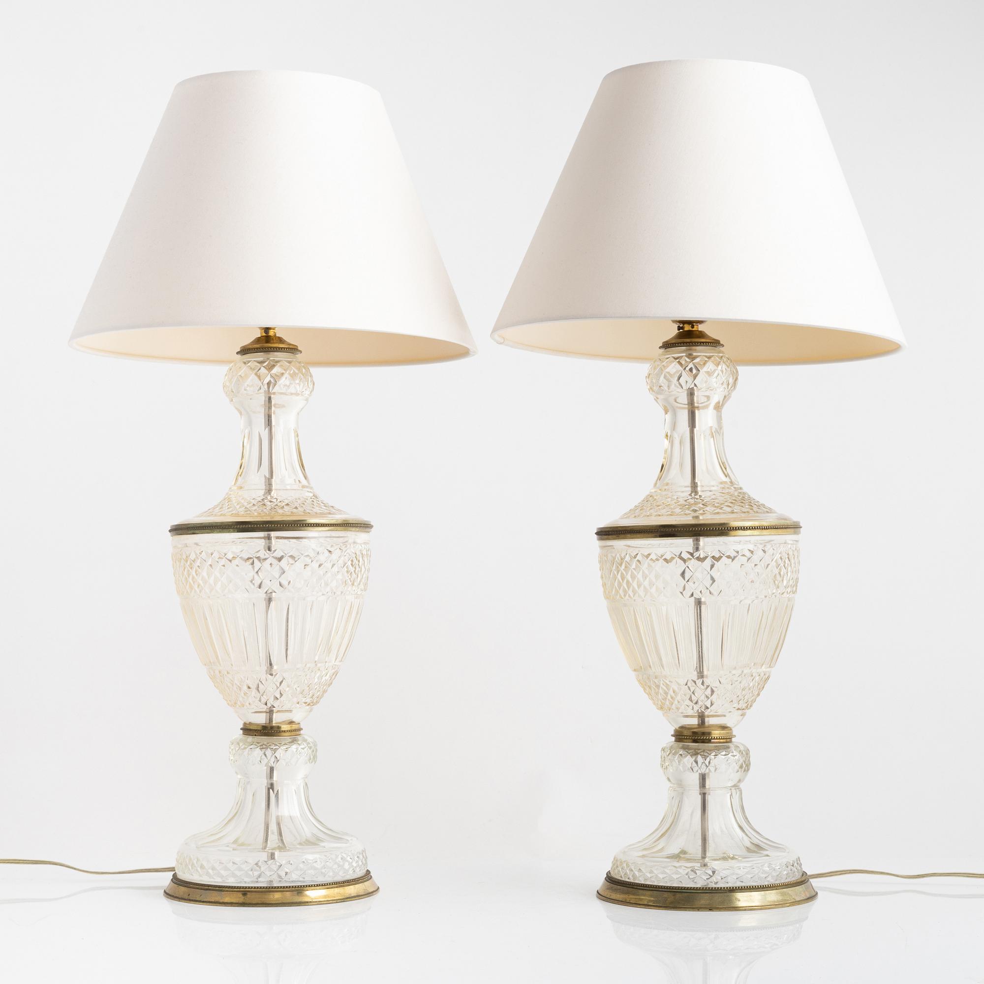 A pair of brass and glass table lamps, first half of the 20th century.