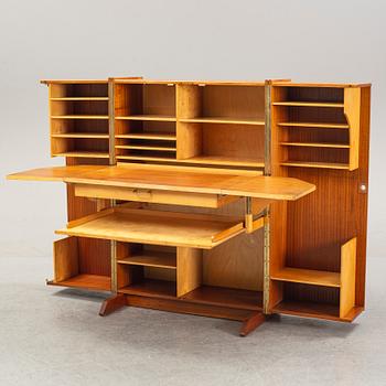 A mahogany veneered convertible cabinet, mid 20th Century.