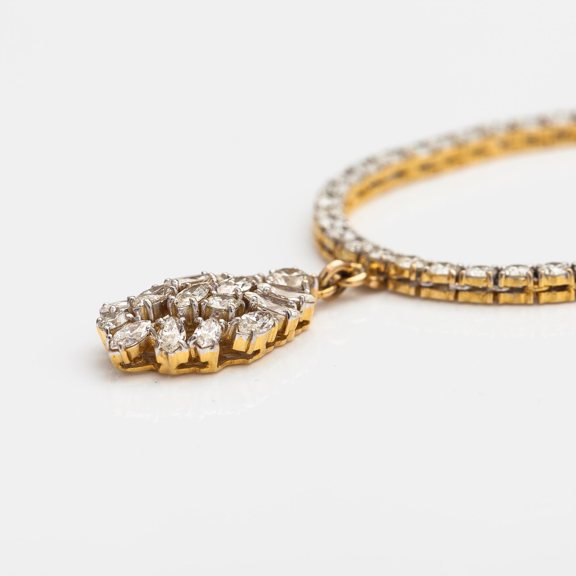 An 18K gold necklace with brilliant and marquise cut diamonds ca. 13.56 cts in total.