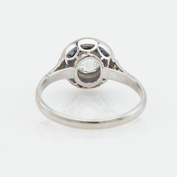Halo ring, platinum with rose-cut diamond and sapphires.