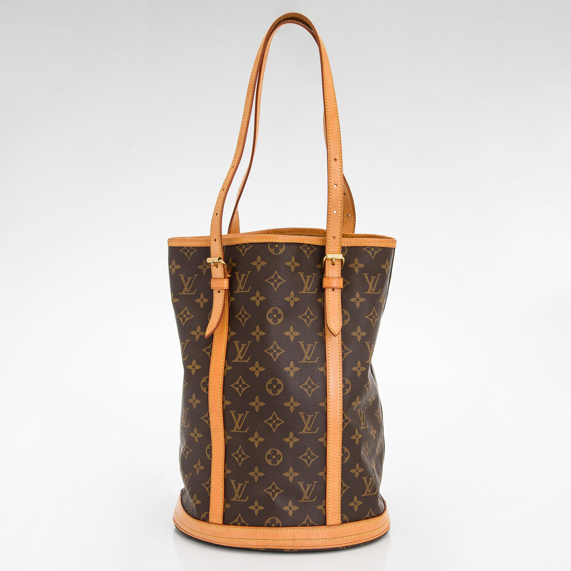 Louis Vuitton, a Monogram Canvas "Bucket" bag and pochette.