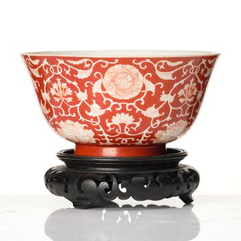 A coral red reverse decorated lotus bowl, Qing dynasty with Daoguang mark in underglaze blue.