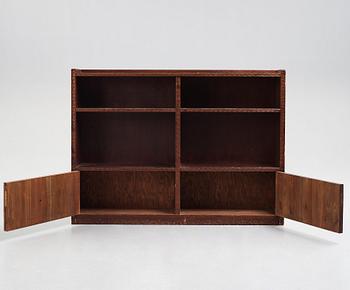 Otto Wretling, attributed to, an Art Nouveau carved pine book shelf, Umeå, Sweden, early 20th century.