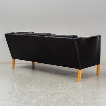 An 'AV59' sofa by Arne Vodder, Nielaus, Denmark.