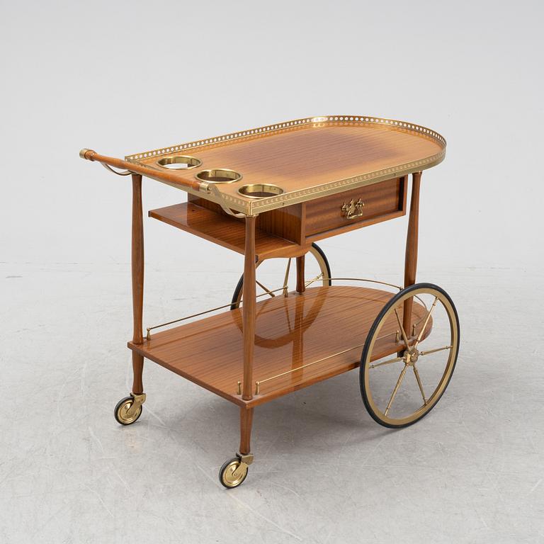 A mahogany-veneered serving trolley, mid 20th Century.