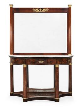 465. A French Empire early 19th century console table and mirror.