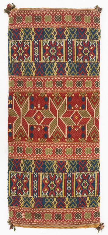 A flat weave carrgie cushion, Järrestad district, c 112 x 48 cm, mid 19th century.