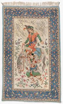 An Isfahan, figural rug, signed, c. 172 x 109 cm.