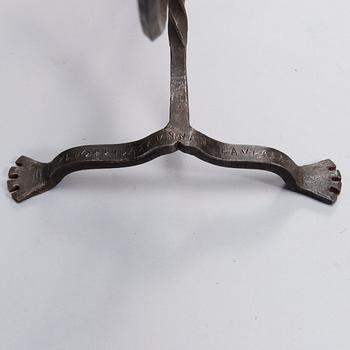 Paavo Tynell, A wrought iron floor candelabrum, oy Taito ab, dated 1926.