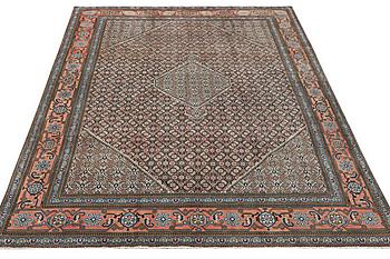 A carpet, Ardebil, c. 334 x 232 cm.