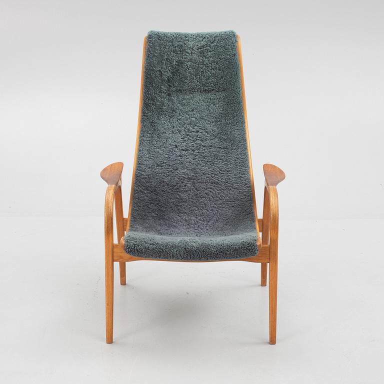 Yngve Ekström, a "Lamino" armchair with ottoman, Swedese, Sweden, 1960's.