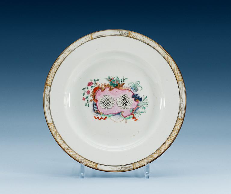 A set of four famille rose armorial dinner plates, Qing dynasty, Qianlong (1736-95).