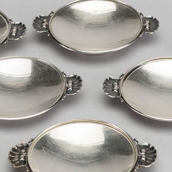 A Danish 20th century sterling set of six ashtrays, mark of G Jensen Copenhagen first half of the 19th century.