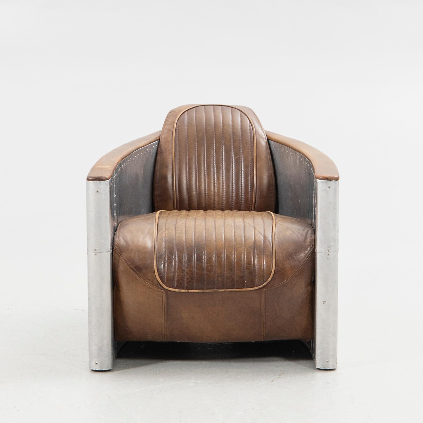Timothy Oulton, armchair, "Tomcat", Artwood, 21st century.